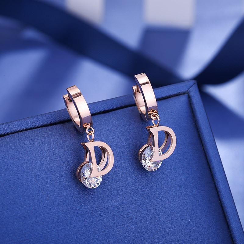 Boucles d'oreilles lettre D en - Vintage Fashion Jewelry Brands avis et prix